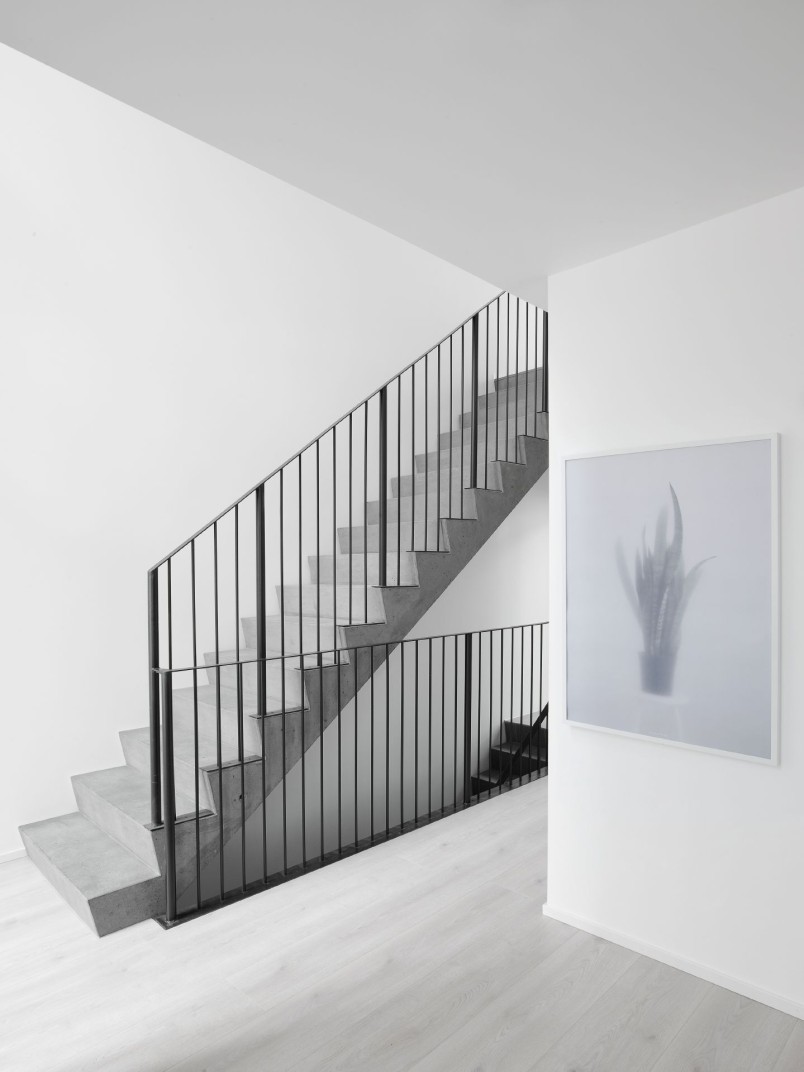 How do paints and coatings affect indoor air quality in green buildings?