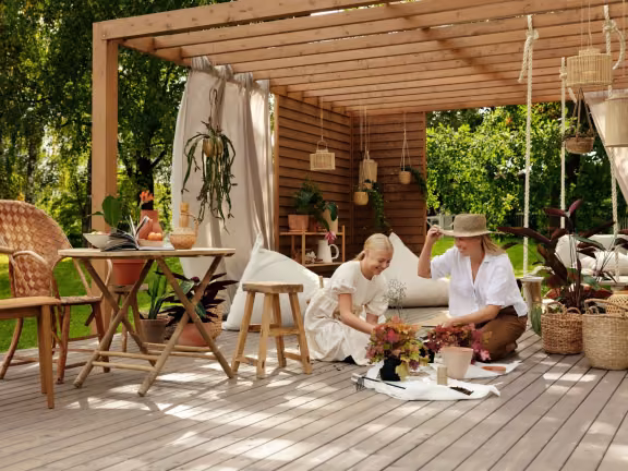 family pergola decorated with neutral colour and plants