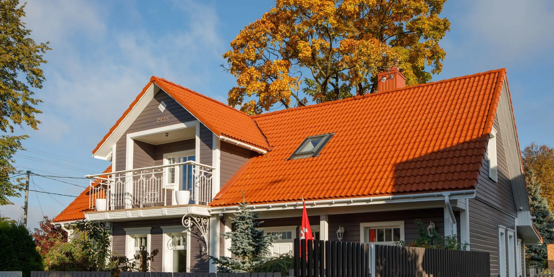 Roof and wooden façade repainting makes house look as good as new